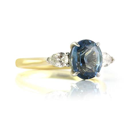 Oval Blue Sapphire Pear Diamond Ring